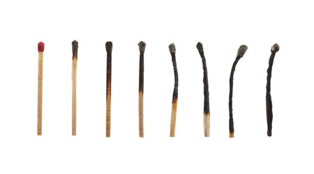 Matches on white background, collage with stages from whole to completely burntの写真素材