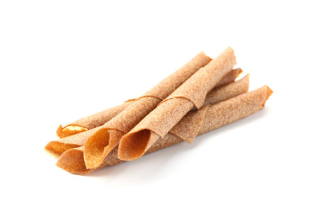 Delicious fruit leather rolls on white backgroundの写真素材