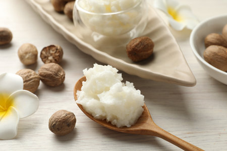 Natural shea butter on white wooden table, closeupの写真素材