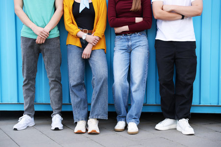 Group of teenagers near building outdoors, closeupの写真素材