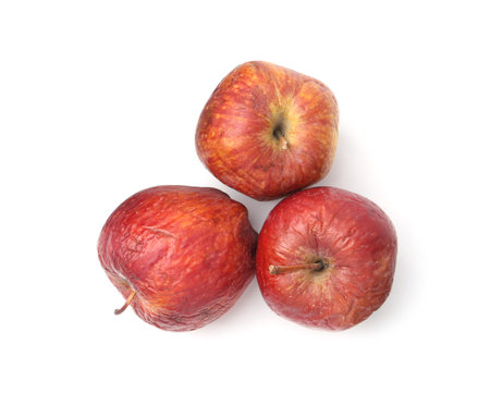 Rotten apples isolated on white, top viewの写真素材