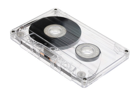 One audio cassette with magnetic tape isolated on whiteの写真素材