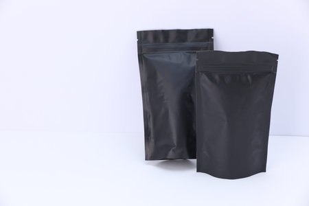 Zipper stand-up pouches on white background. Mockup for designの写真素材