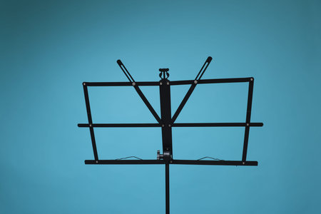 One empty note stand on light blue backgroundの写真素材