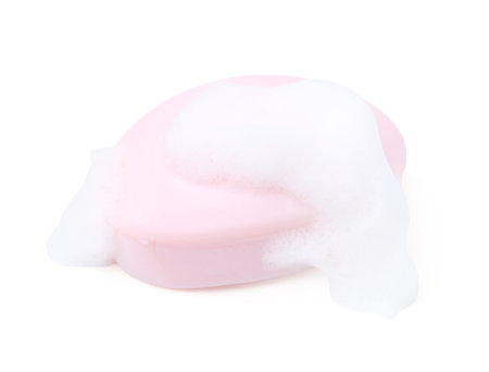 Soap bar with foam isolated on whiteの写真素材