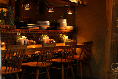 Many tables, table and counter in cozy cafe interiorの写真素材