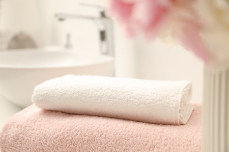 Stack of soft towels in bathroom, closeupの写真素材