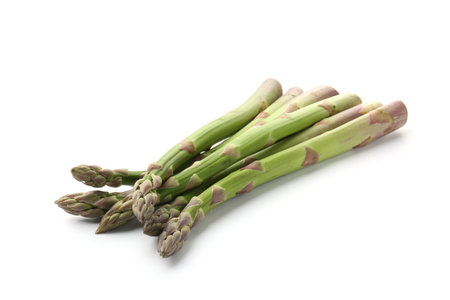 Fresh raw asparagus spears isolated on whiteの写真素材