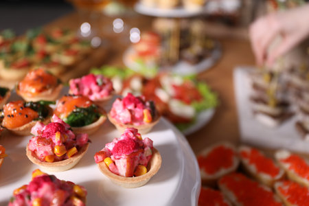 Buffet menu. Tasty stuffed tartlets on stand, closeupの写真素材