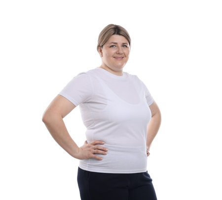 Weight loss. Plus size woman on white backgroundの写真素材