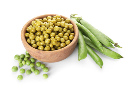 Pickled peas in bowl and pods isolated on whiteの写真素材