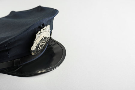 One police cap on white background, closeup. Space for textの写真素材