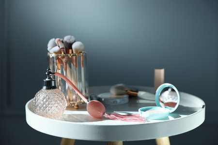 Different makeup products on white table against gray background, closeupの写真素材