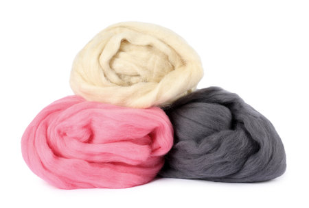 Different color felting wool isolated on whiteの写真素材