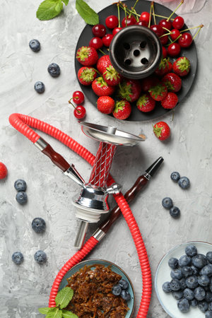 Hookah and fresh fruits on gray table, flat layの写真素材
