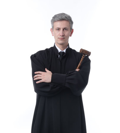 Judge with mallet in court dress on white backgroundの写真素材