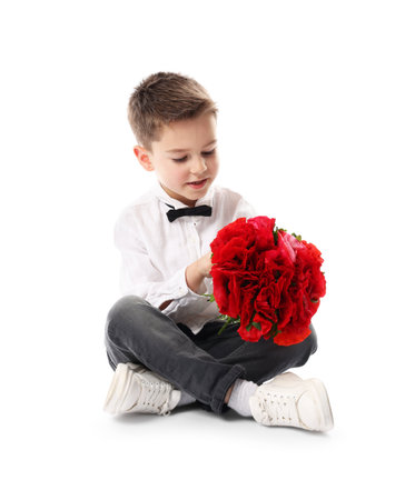 Cute little boy with bouquet of beautiful flowers on white backgroundの写真素材