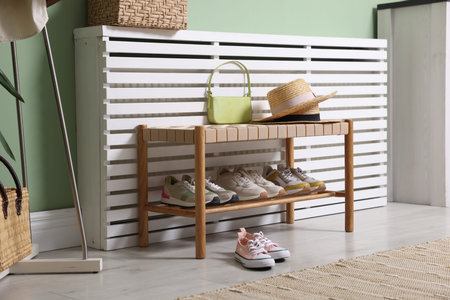 Different footwear and accessories in hallway indoorsの写真素材