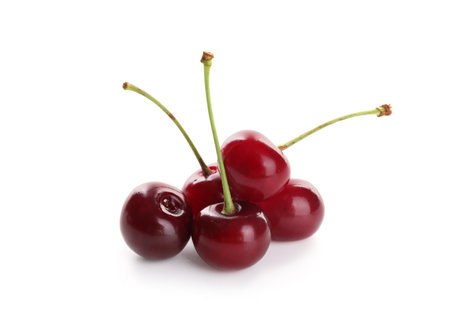 Many fresh ripe cherries isolated on whiteの写真素材