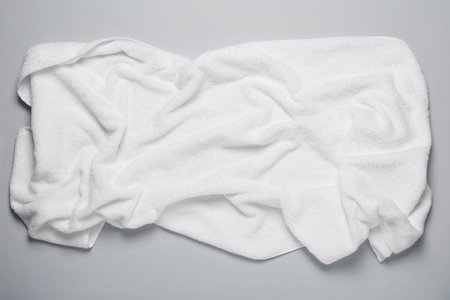 White terry towel on light gray background, top viewの写真素材