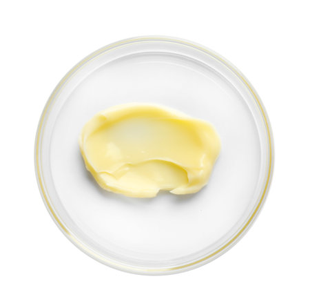 Cosmetic product in Petri dish isolated on white, top viewの写真素材