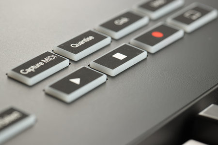 One portable MIDI keyboard with buttons, closeup