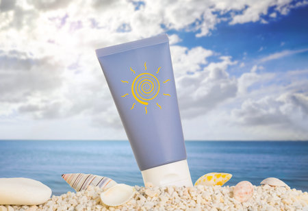 Sunscreen product in tube with drawing of sun on beach