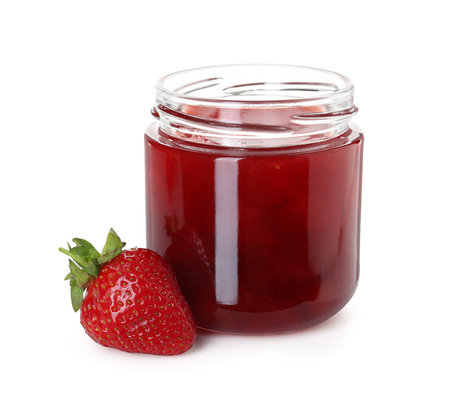 Tasty strawberry jam in jar and fresh berry isolated on whiteの写真素材