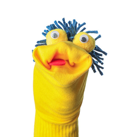Funny sock puppet with hair isolated on whiteの写真素材