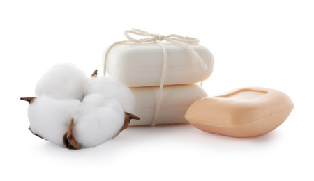 Soap bars and cotton flower isolated on whiteの写真素材