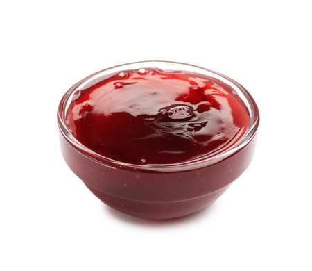 Tasty cherry jam in bowl isolated on whiteの写真素材