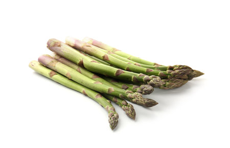 Fresh raw asparagus spears isolated on whiteの写真素材