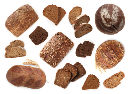 Freshly baked bread on white background, collage. Top viewの写真素材
