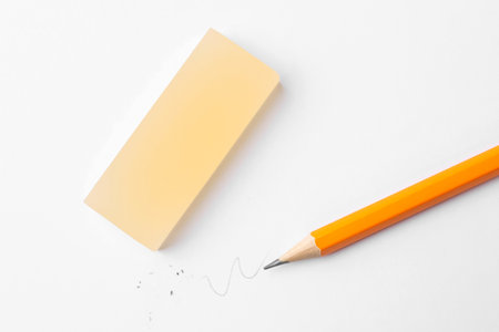 Pencil and eraser on white background, flat layの写真素材