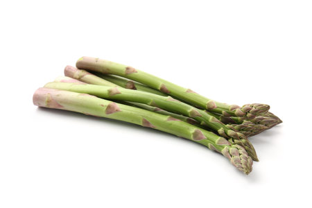 Fresh raw asparagus spears isolated on whiteの写真素材