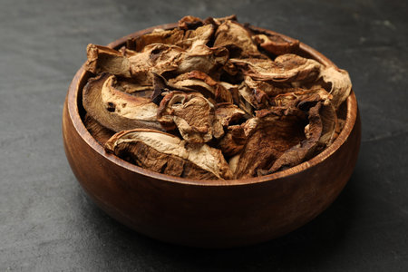 Dried chanterelle mushrooms on wooden table, closeupの写真素材
