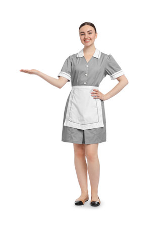 Full-length portrait of happy chambermaid on white backgroundの写真素材
