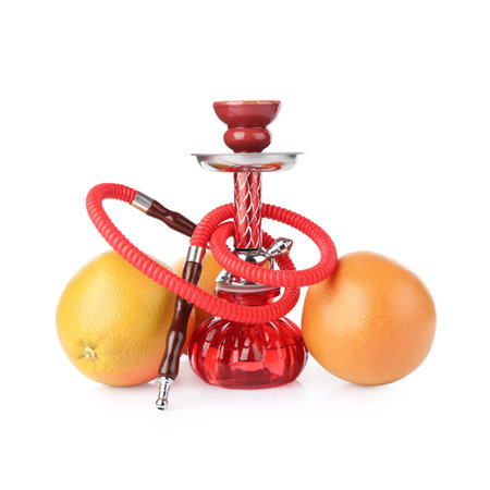 Red traditional hookah and grapefruits isolated on white