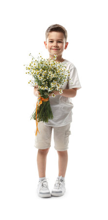 Cute little boy with bouquet of beautiful chamomile flowers on white backgroundの写真素材
