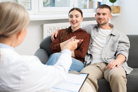 In vitro fertilization (IVF). Couple having consultation with doctor in reproductive clinicの写真素材