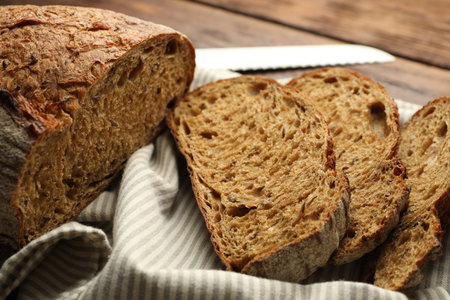 Pieces of fresh bread on table, closeup