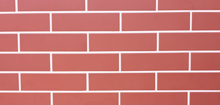 Texture of red brick wall as background, closeup