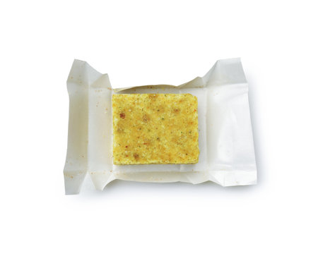 One aromatic bouillon cube isolated on white, top viewの写真素材