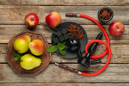 Hookah, coal and fresh fruits on wooden table, flat layの写真素材