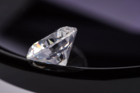 One beautiful shiny diamond on glasses, closeup. Space for textの写真素材