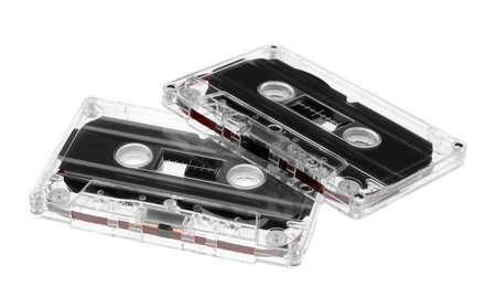 Audio cassettes with magnetic tapes isolated on white