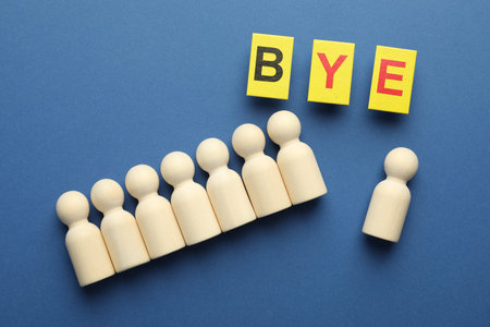 Dismissal. Word Bye and human figures on blue background, flat layの写真素材