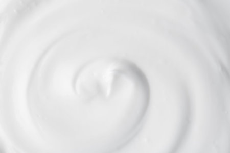 Texture of tasty yogurt as background, top view