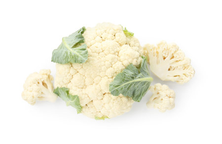 Fresh cauliflower head and pieces of florets isolated on white, top viewの写真素材
