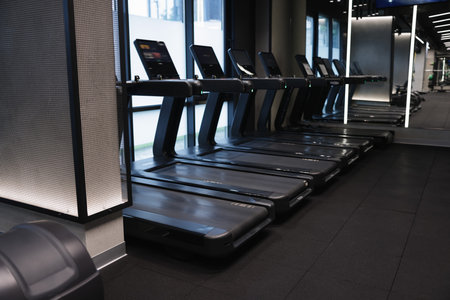 Many modern professional treadmills in gym. Healthy lifestyle